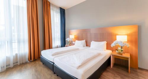 PLAZA Premium Köln Room Type - Junior Suite