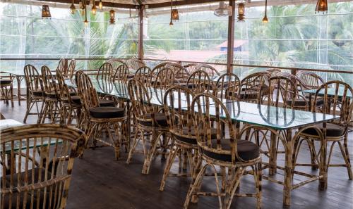 Restaurant, Dhanrains Moon Light Retreat Cottages in Palolem