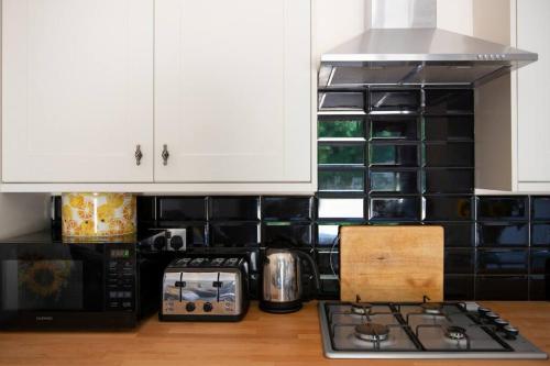 The Tack Room - rural boutique retreat for two in Angmering