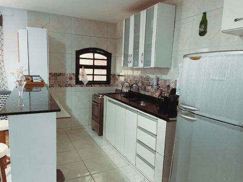 Kitchen, Praiana do Luquinhas - Macumba / Pontal / RicoSurf near Bar Summer Drink's.