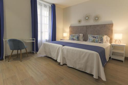 Superior Triple Room room in Dorinda Rooms
