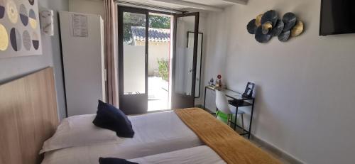 Chambre avec 2 lits, confort, terrasse