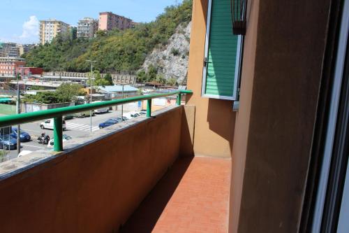 Three-Bedroom Apartment with Balcony room in LA LANTERNA DI ANGELO rent rooms and apartments free parking on the street front
