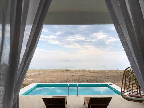 Villa Bari Loft Room Type - Deluxe Bungalow with Sea View Villa Bari Loft Room Type - Deluxe Bungalow with Sea View