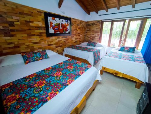 2 double beds, 1 twin bed