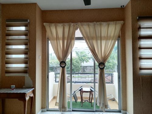 View, DKAMAR Homestay At Desaru, Fully Aircond, WiFi, Coway, Street View 4 min to Desaru Beach in Desaru