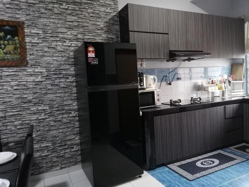 Kitchen, DKAMAR Homestay At Desaru, Fully Aircond, WiFi, Coway, Street View 4 min to Desaru Beach in Desaru