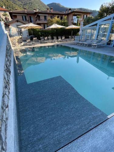 泳池, 拉里奧酒店 (Hotel Lario) in 特雷麥作