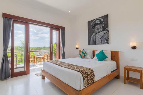 Frangipani House and Spa by ecommerceloka Room Type - Deluxe Room