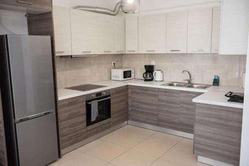 廚房, Overlooking park flat close to the Piraeus Port-(DRAP-A7) in 泰普希賽-烏永尼區