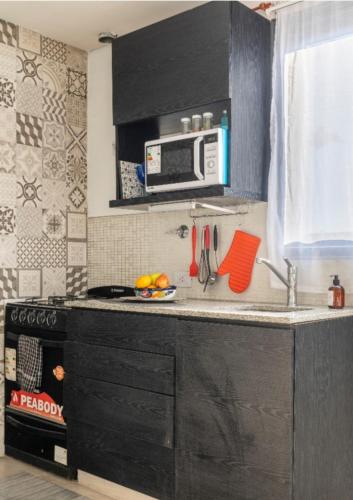 Kitchen, Luminoso,tranquilo y practico estudio en zona sur con balcon y cochera in Banfield