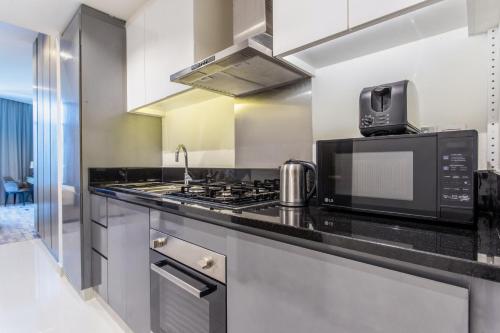 The S Holiday Homes Canal view Studio and One Bedroom Apartments Damac Maison Prive - main image