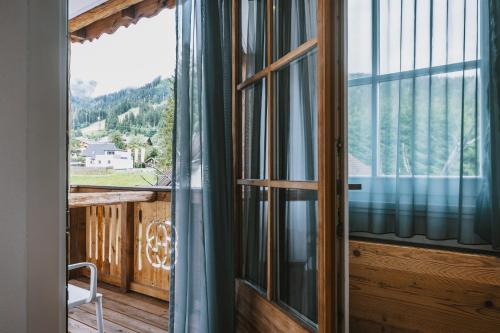 Балкон/тераса, Hotel Flachauerhof in Флахау