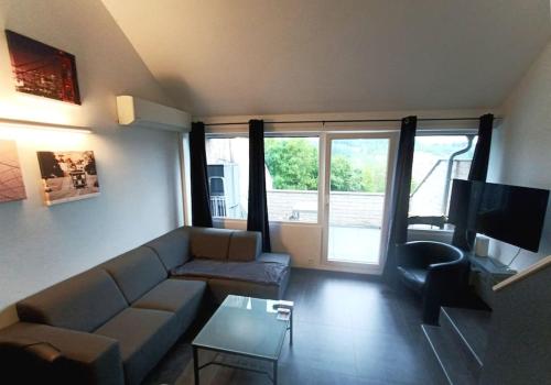 Le Havre du Circuit / Triplex avec Sauna in Malmedy