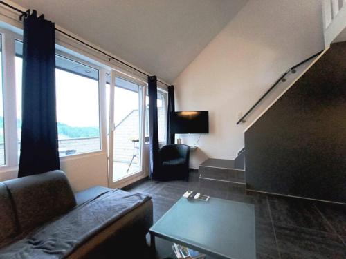 Le Havre du Circuit / Triplex avec Sauna in Malmedy