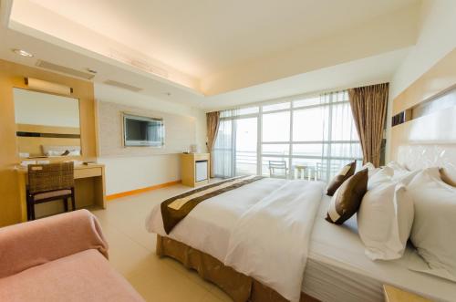 Double Room with Balcony and Sea View room in Yake Homestay