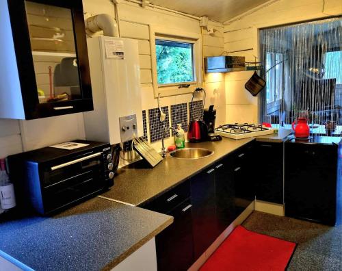 Chalet op een rustig park in de natuur in พุดเทน