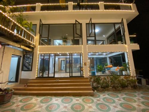 Nắng Homestay - Tap to explore photos