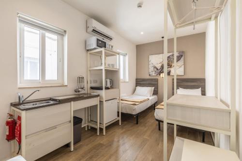 Studio apartment with twin beds & kitchenette at the new Olo living 24