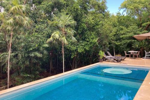 Aku-Chic Newly furbished condo Jungle pool in Xetna, Mexico