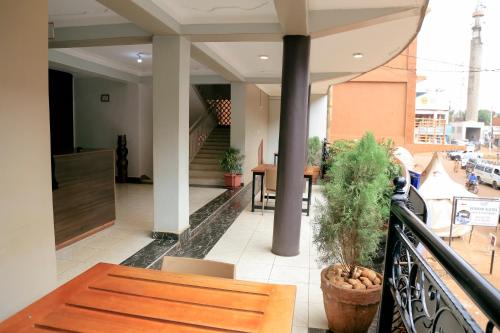 Koplietošanas atpūtas telpa ar TV, Scindia suites hotel in Jinja