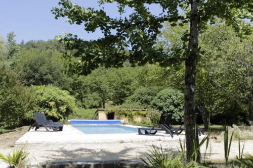 Maison dans le bourg, 6-8 couchages avec piscine - Location saisonnière - Groléjac