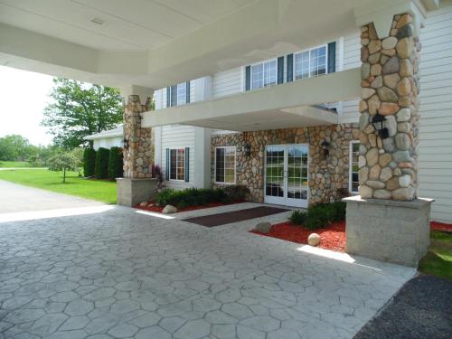 Bejárat, American Inn and Suites Houghton Lake in Houghton Lake (MI)