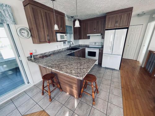 Jolie maison sur notre ranch in Sacré-Coeur (QC)