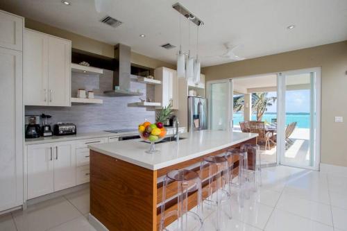 Crystal Blue Water Front Home with Pool in Chalk Sound