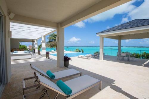 Crystal Blue Water Front Home with Pool in Chalk Sound
