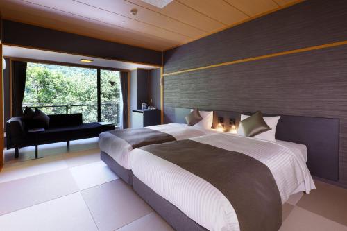 Twin Room with Tatami Area and Sofa Bed - Shared Bathroom - Non-Smoking