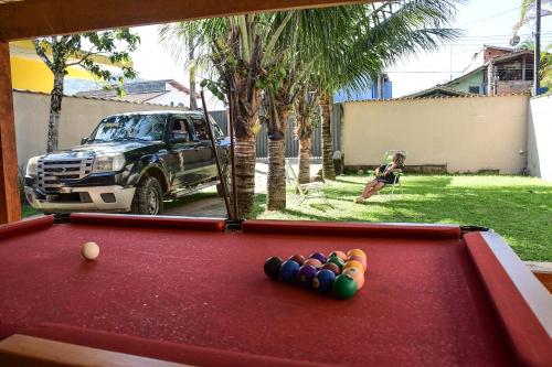 Casa UBATUBA com MESA DE BILHAR, CHURRASQUEIRA, AR CONDICIONADO, SUÍTE, 350m da praia