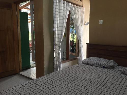 De Ikut Bojo Homestay Room Type - Economy Double Room