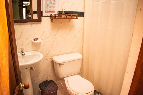 Quadruple Room with Private Bathroom image 1