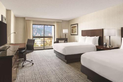 Queen Room with Two Queen Beds and Mobility Accessible Tub room in DoubleTree By Hilton Colorado Springs