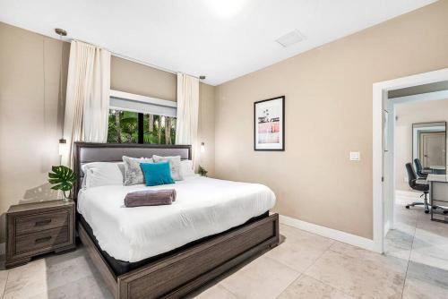 Coconut Grove Villa with heated Pool sleeps 12 - Tap to explore photos
