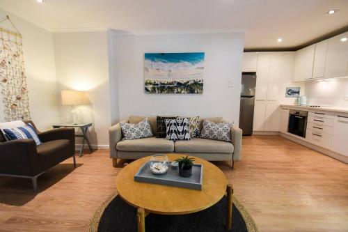 Resort-style Coastal Living with Balcony & Pool - image 2