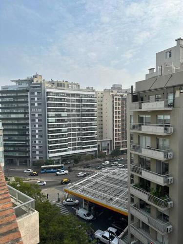 Half of one floor Panoramic Apartment in the best area of Belgrano all in front Private parking with direct access to lobby just meters from the Subway and Belgrano train station 2 bedrooms Barbecue Solarium Large kitchen Laundry room and furniture new