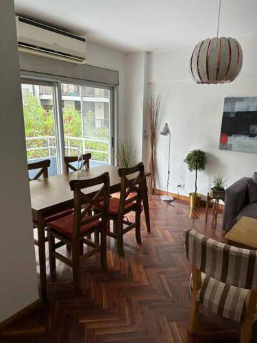Half of one floor Panoramic Apartment in the best area of Belgrano all in front Private parking with direct access to lobby just meters from the Subway and Belgrano train station 2 bedrooms Barbecue Solarium Large kitchen Laundry room and furniture new