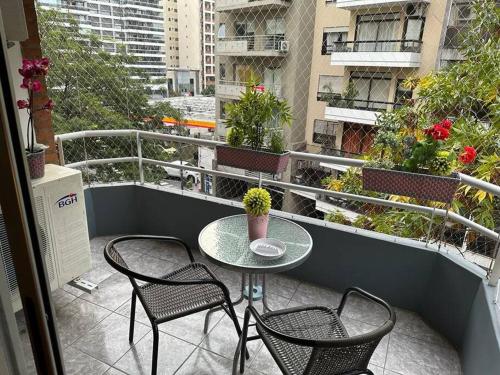 Half of one floor Panoramic Apartment in the best area of Belgrano all in front Private parking with direct access to lobby just meters from the Subway and Belgrano train station 2 bedrooms Barbecue Solarium Large kitchen Laundry room and furniture new