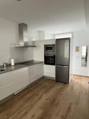 virtuve, Apartamento paseo marítimo Camelle (Apartamento paseo maritimo Camelle) in Braño
