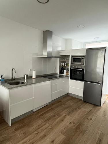 virtuve, Apartamento paseo marítimo Camelle (Apartamento paseo maritimo Camelle) in Braño