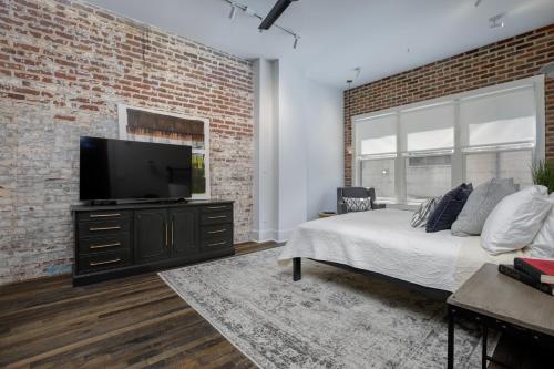 Loft condo w parking & patio Apt 101 - Tap to explore photos