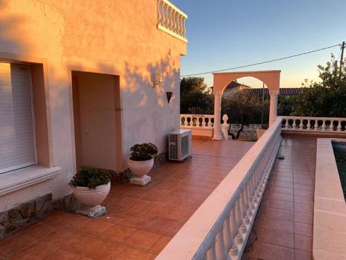 Villa Leo con vistas al mar y piscina privada in El Mas Fumats