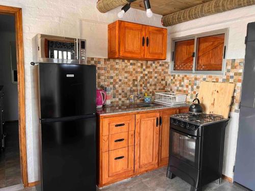 廚房, Villa Serrana Cabaña Tata Ruben y Olga 2dormitorios (Villa Serrana Cabana Tata Ruben y Olga 2dormitorios) in 維拉塞拉納