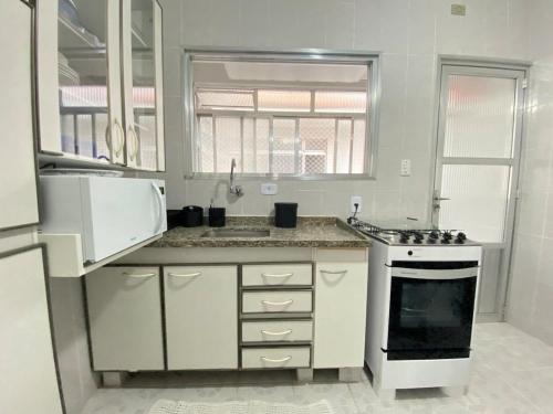 Apartamento encantador próximo da Praia da Enseada (Apartamento encantador proximo da Praia da Enseada) in Vila Julia