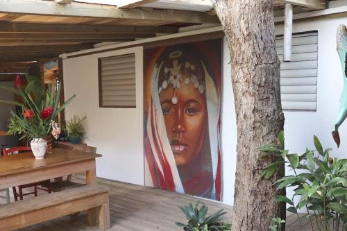 Malendure, maison en bord de mer à l'ombre du manguier