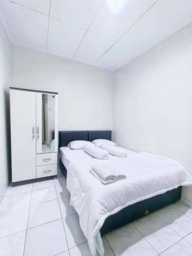 Kost Griya Asri by ecommerceloka, Dżakarta