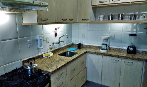 廚房, AP104 - Apartamento Completo, 3 quartos confortáveis (AP104 - Apartamento Completo, 3 quartos confortaveis) in 雅爾丁伊圖薩巴拉