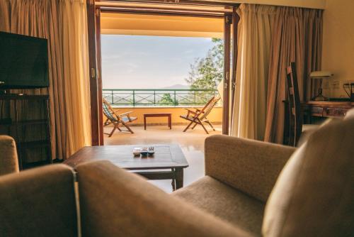 ระเบียง/ชานเรือน, อมฤตาร อัมบัตตี กรีน รีสอร์ต (Amritara Ambatty Greens Resort) in วิรัชเพต